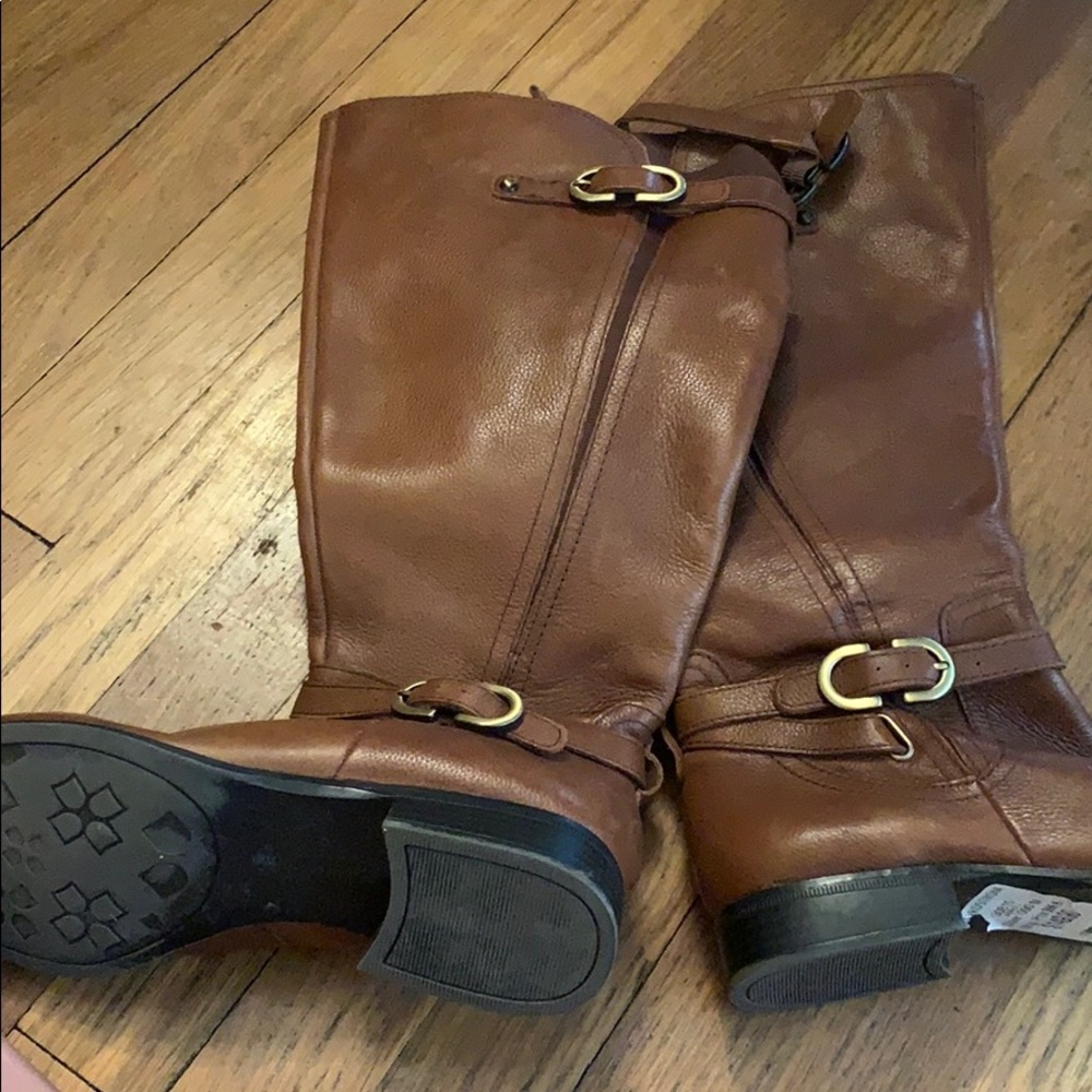 Brown high books with buckle